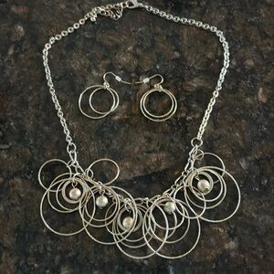 Silver tone hoop necklace earring set